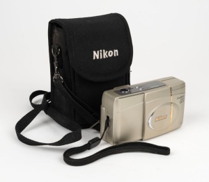NIPPON KOGAKU: Lite Touch Zoom 100W AF compact camera [#4003788], c. 1990s, in maker's cloth case.