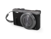 PANASONIC: Lumix DMC-TZ60 Leica digital camera [#WP4FB001455], c. 2014, with DC Vario-Elmar 6.4-129mm f6.4-4.3 lens, battery pack, and memory card.