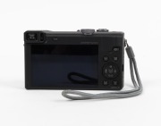 PANASONIC: Lumix DMC-TZ60 Leica digital camera [#WP4FB001455], c. 2014, with DC Vario-Elmar 6.4-129mm f6.4-4.3 lens, battery pack, and memory card. - 3
