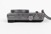 PANASONIC: Lumix DMC-TZ60 Leica digital camera [#WP4FB001455], c. 2014, with DC Vario-Elmar 6.4-129mm f6.4-4.3 lens, battery pack, and memory card. - 4