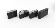 VARIOUS MANUFACTURERS: Group of four cameras - one Fujica Auto-M, one Kodak No. 1A Pocket in maker's box, one Minolta SR-1 with front lens cap, and one Zeiss Ikon Nettar 517/16 in matching leather case. (4 cameras) - 3