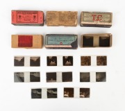 Group of sixty-eight boxed c. 1910s 10.5 x 4.5cm stereo glass slides, likely for Verascope, featuring street views of French parades, fountains, gardens, and others. (68 items)