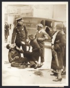 SOCIAL UNREST: Six 1930s press agency photographs - images of the February 1934 Madison Square Garden riot, slain and injured rioters in 1934 Vancouver, images of police actions during hosiery mill strikes in Philadelphia, and Paris 1934 schoolteachers' p