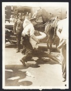 SOCIAL UNREST: Six 1930s press agency photographs - images of the February 1934 Madison Square Garden riot, slain and injured rioters in 1934 Vancouver, images of police actions during hosiery mill strikes in Philadelphia, and Paris 1934 schoolteachers' p - 5