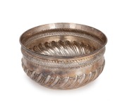 A Georgian sterling silver fruit bowl with gadrooned decoration, by Robert Sallam of London, circa 1768, 10cm high, 21.5cm diameter, 644 grams.