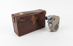 BELL & HOWELL: 605 Double Run Eight movie camera with Schneider-Kreuznach Xenar 38mm f2.8 lens and Bell & Howell leather case, c.1935.