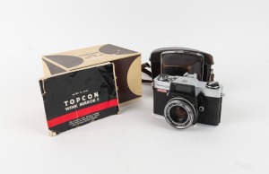 TOKYO KOGAKU: Topcon Wink Mirror-E SLR camera with UV Topcor 48mm f2 lens, Topcon leather case, instruction booklet, and maker's box, c. 1962.