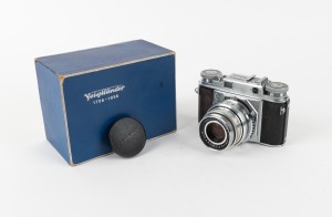 VOIGTL&Auml;NDER: Prominent rangefinder camera with&nbsp;Dynaron 100mm f4.5 lens,&nbsp;Voigtl&auml;nder lens cap, and maker's box, c. 1953.