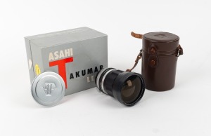ASAHI KOGAKU: Auto-Takumar 35mm f2.3 lens [#370804] with Takumar front and rear lens caps, Asahi Kogaku leather case, and maker's box.