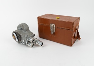 EMEL: Emel double-8 movie camera with three lenses, viewfinder attachment, and Emel leather case containing several other parts and accessories, c. 1930s.