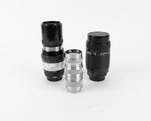 NIPPON KOGAKU: Group of three lenses - one screw-mount Nikkor-Q&middot;C 135mm f3.5 with rear lens cap, one AF Nikkor 70-210mm f4-5.6 with Nikon front and rear lens caps, and one Nikkor-Q Auto 200mm f4 with Nikon rear lens cap. (3 items)
