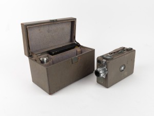 KODAK: Cin&eacute;-Kodak Model B&middot;B 16mm movie camera in matching case with additional lens and several other Kodak accessories, c. 1920s.