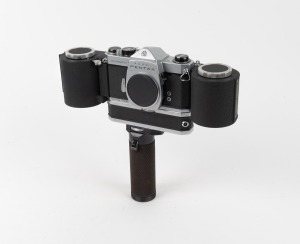 ASAHI KOGAKU: Pentax Spotmatic Motor Drive SLR camera body [#2388488] with motor drive unit [#70001], battery grip, twin film spool back attachment [#12131], and body cap, c. 1967.