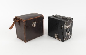 KODAK: Two-tone black and burgundy Beau Brownie No. 2A 116 film camera with leather case, c. 1930.