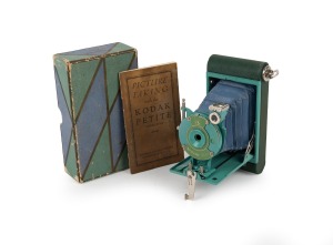 KODAK: Petite 127 film camera, in teal with original maker's box and instruction booklet, c. 1931.