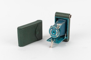 KODAK: 'Lightning Bolt' Petite 127 film camera, in rare green with matching leather case, c. 1931.