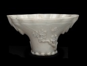 A Chinese blanc de chine porcelain libation cup, Qing Dynasty, 19th/20th century, ​​​​​​​7cm high, 13.5cm wide. - 2