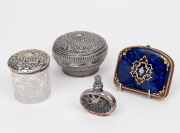 An antique sterling silver lidded hobnail glass jar, a Burmese silver box, a silver overlay glass scent bottle with crown stopper, and a blue enamel antique purse (A/F), 19th/20th century, (4 items), the purse 7.5cm wide.