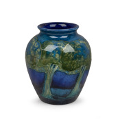 MOORCROFT "Moonlit Blue" English pottery vase, circa 1920, impressed "MOORCROFT, MADE IN ENGLAND" with underglaze signature in blue, ​​​​​​​9cm high.