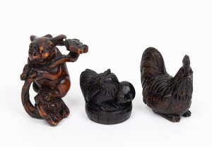 Three Japanese carved boxwood netsuke, 20th century, ​​​​​​​the largest 5cm high.