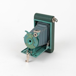 KODAK: Petite 127 film camera, in teal with original coloured bellows, c. 1931.