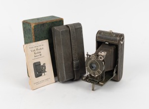KODAK: Vest Pocket Kodak Series III Vanity 127 film camera, in grey with original bellows, Kodak Anastigmat 83mm f6.3 lens [#41624], matching satin-lined case, and original maker's box, c. 1930.