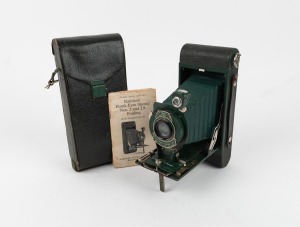KODAK: No. 2A Folding Rainbow Hawk-Eye Special 116 film camera, in green with Kodak Anastigmat 127mm f6.3 lens, leather case, and instruction booklet, c. 1931.