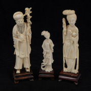 Three assorted Chinese carved ivory statues on timber stands, early to mid 20th century, ​​​​​​​the largest 18.5cm high overall.