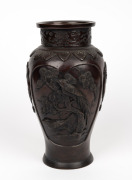 An antique Chinese bronze vase with bird and floral decoration, 19th century, 28cm high