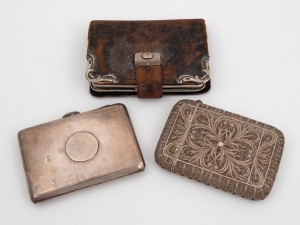A filigree sterling silver calling card case; together with an antique sterling silver cigarette case and an antique sterling silver mounted leather wallet, (3 items), 130 grams silver weight