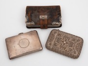 A filigree sterling silver calling card case; together with an antique sterling silver cigarette case and an antique sterling silver mounted leather wallet, (3 items), 130 grams silver weight