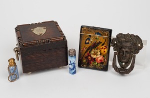 An antique hand-painted calling card case; together with an antique sterling silver topped porcelain scent, an antique chatelaine scent bottle, a door knocker and an antique English oak box with shield plaque, 19th/20th century, (5 items), the card case 1
