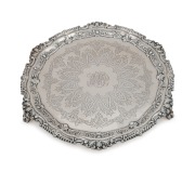 An antique English sterling silver salver with engraved decoration and monogram cartouche, made in London by George Jackson and David Fullerton, circa 1896, 28cm across, 742 grams.