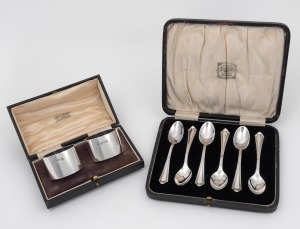 A boxed set of six English sterling silver teaspoons, Birmingham, circa 1924; together with a pair of English sterling silver napkin rings in original presentation case, by Thomas Bradbury & Sons of Sheffield, circa 1893, 190 grams total silver weight