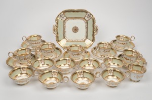 Antique English porcelain tea ware with sage green border and gilt decorated highlights, early to mid 19th century, (24 items), the platter 26cm across