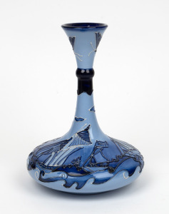 MOORCROFT centenary (1897-1997) "Florian" English pottery vase on dark blue ground with yacht decoration, factory mark and artist's details to base, 24cm high.