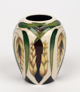 MOORCROFT "Ceres" English pottery vase on cream ground, by Philip Gibson, circa 2007, factory mark and artist's details to base, 9.5cm high.
