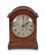 An antique German Gustav Becker mahogany cased mantle clock with three train Westminster gong chiming movement with chime silent feature and Roman numerals to the silver dial, early 20th century, 39cm high