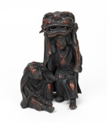 A Chinese patinated spelter figural group, 20th century, 17cm high