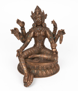 A Sino-Tibetan cast copper Green Tara seated statue inlaid with silver, turquoise and red stone, ​​​​​​​20th century, 20cm high