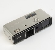 MINOLTA: Minolta 16-Ps Camera Kit [#877275], c. 1964, in maker's box with leather camera case, flash attachment with matching case, clamp attachment, and printed matter. - 2