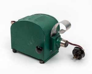 MAXCRAFT PROJECTION MANUFACTURING COMPANY: 'Roama - This is All Australian' film projector, height 15.5cm, with original power cord.