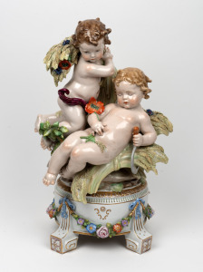An antique Continental porcelain four seasons harvest figural group, most likely Austrian or German, 19th/20th century, ​​​​​​​49cm high.