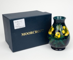 MOORCROFT "Buttercup" English baluster shaped pottery vase with yellow floral decoration on blue ground, in original box of issue, circa 1990, impressed factory mark and artist details to base, 14cm high