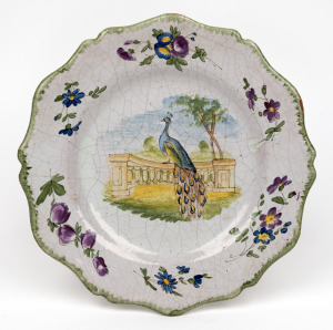 An antique Continental tin glazed earthenware cabinet plate with peacock decoration, 18th century, ​​​​​​​24.5cm wide