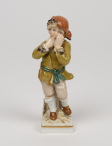 K.P.M. antique German porcelain statuette of a boy in a green jacket, 19th century, 10.5cm high