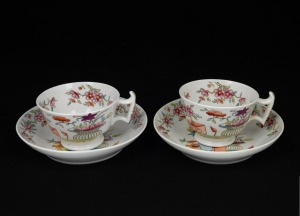 A pair of antique English porcelain teacups and saucers in the Famille Rose Chinese style, 18th/19th century, (4 items), the saucers 14cm diameter
