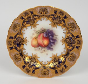 ROYAL WORCESTER cabinet plate, hand-painted with fruit decoration, dark blue border and ornate gilt highlights, puce factory mark to base, 22.5cm wide