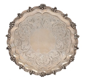 An antique English sterling silver salver with engraved decoration, made in London by Samuel Hayne and Dudley Carter, circa 1853, 26.5cm wide, 495 grams.