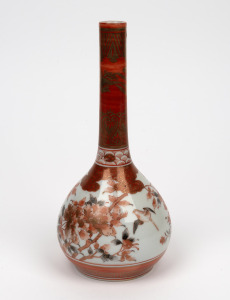 An antique Japanese Kutani bottle vase, decorated with flying birds and peonies, Meiji Period, 19th century, 22cm high